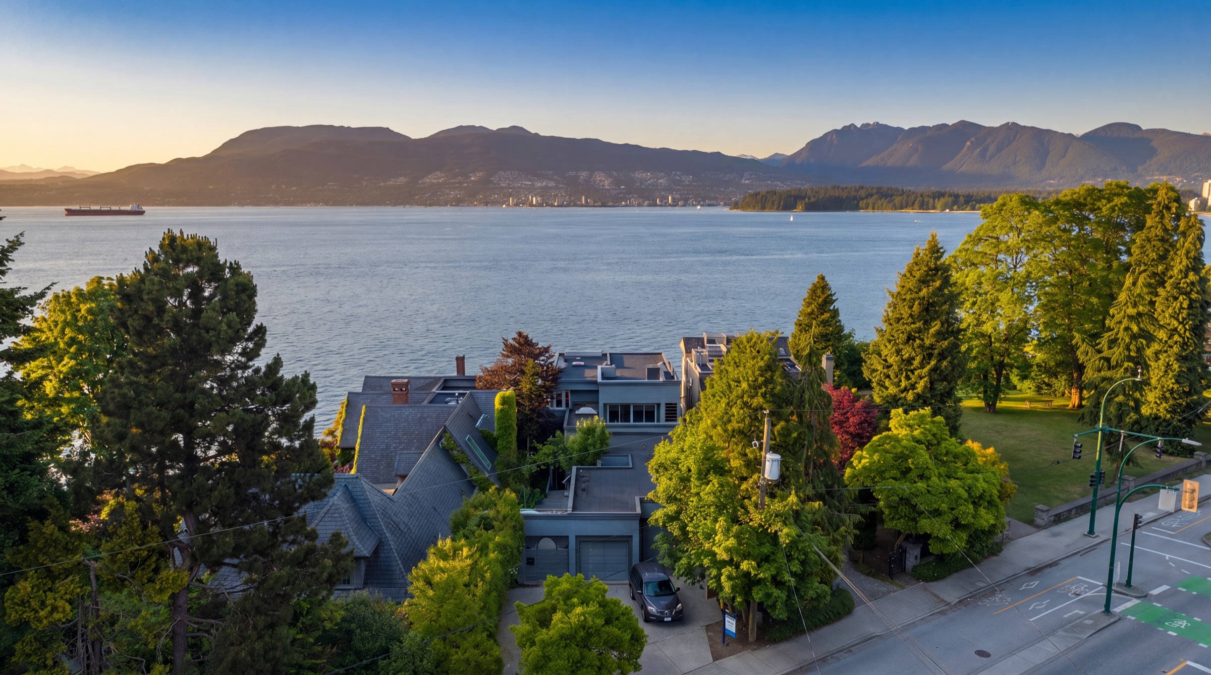 Golden-hour aerial of 2711 Point Grey Road over English Bay